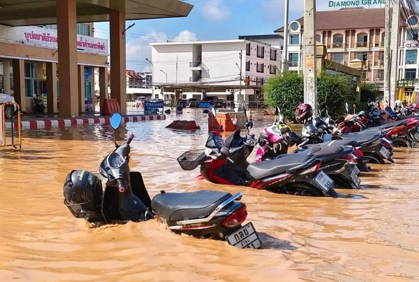 Submerged scooters during the Chiang Mai 2024 flood