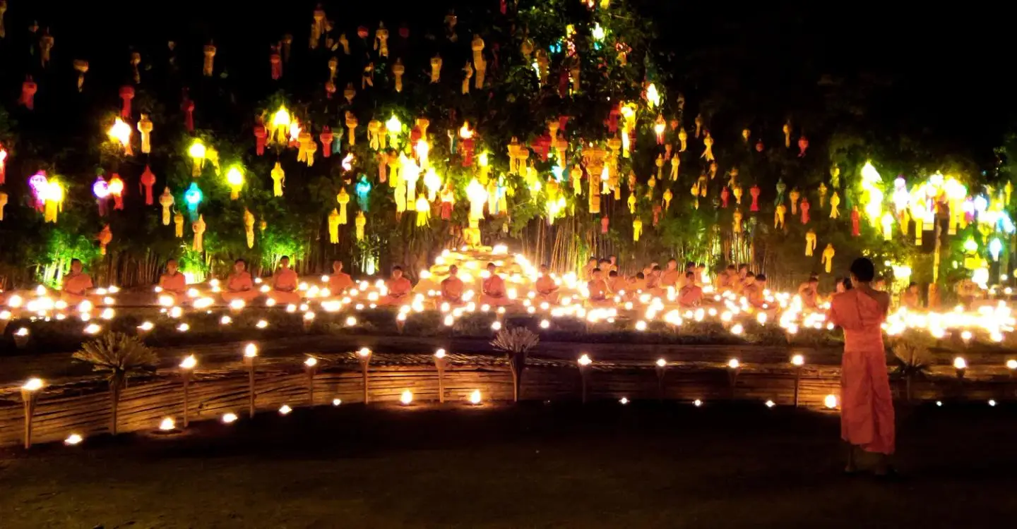Wat Phan Tao lit by hundreds of candles and hanging lanterns during Yi Peng