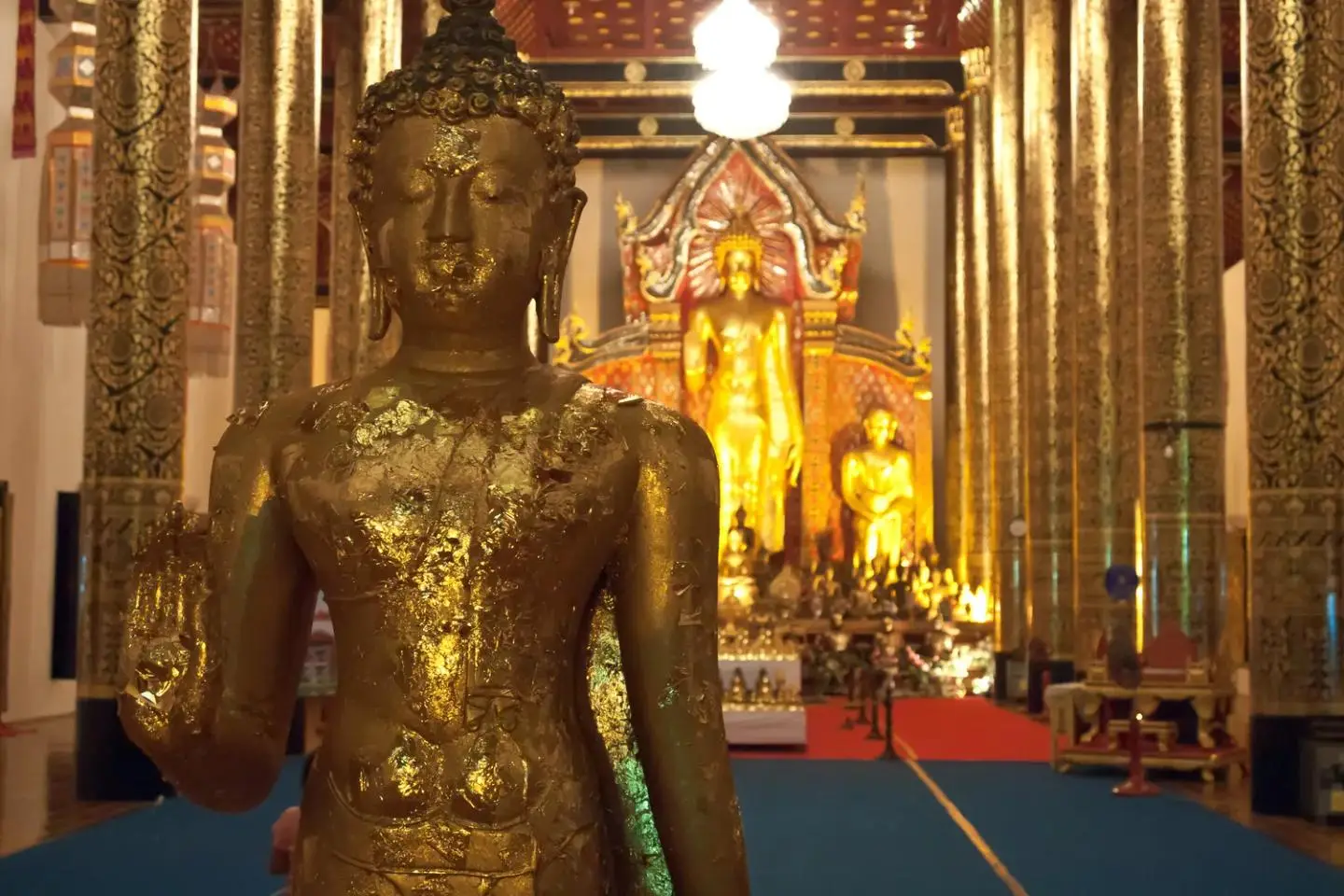 A gilded Buddha inside Wat Chedi Luang
